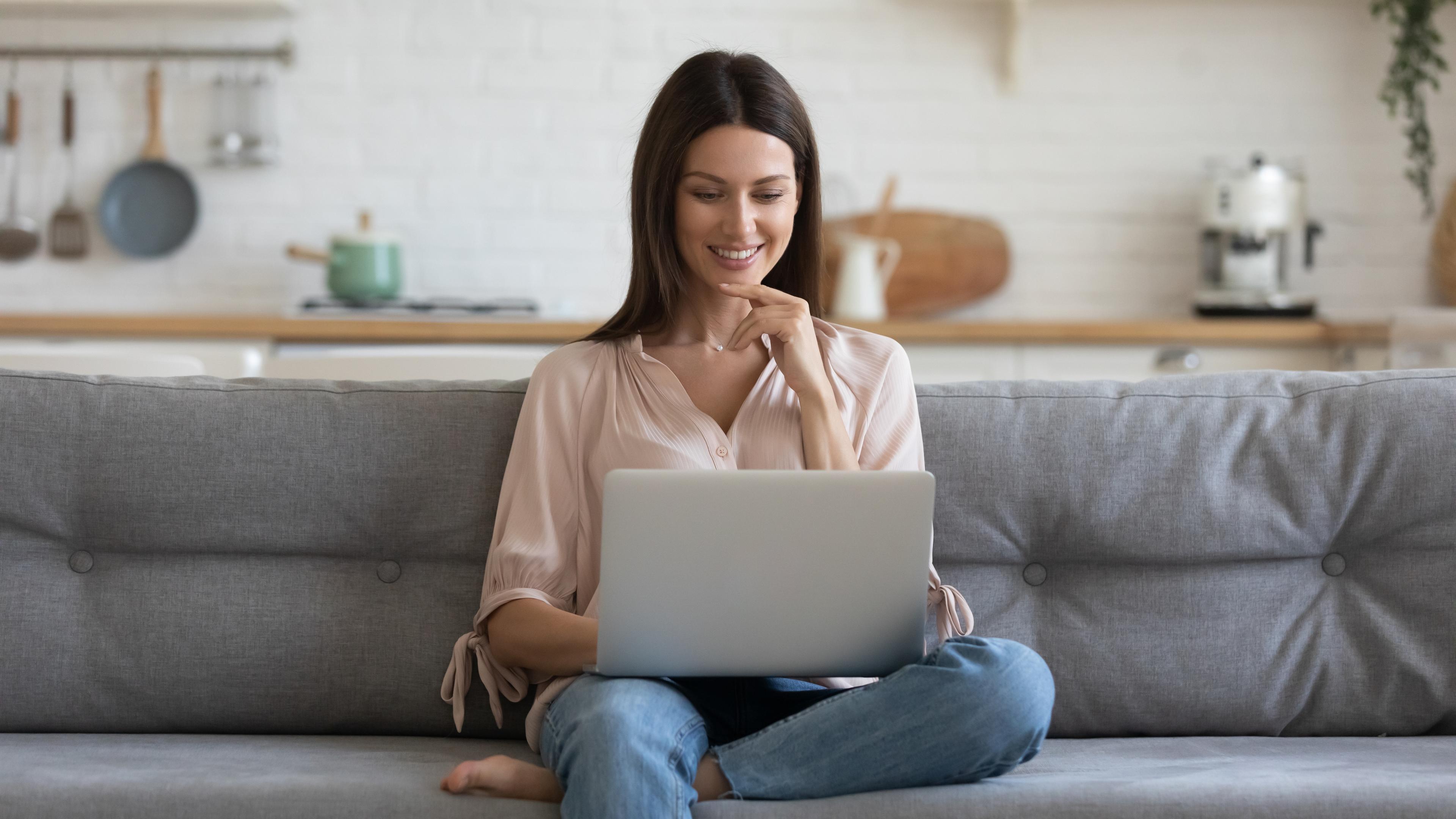 Lady with laptop smiling